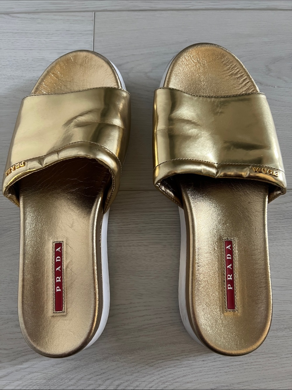 Prada Metallic Gold Slide Sandals with White Sole